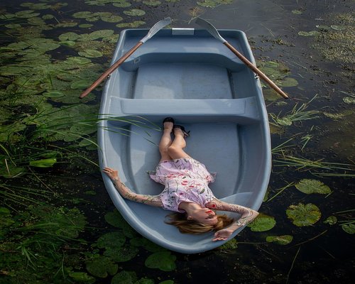 A person sleeping peacefully in a dark room without digital devices